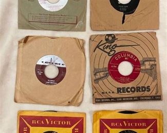 Six 45 rpm records featuring Andy Williams, Dinah Shore, and more