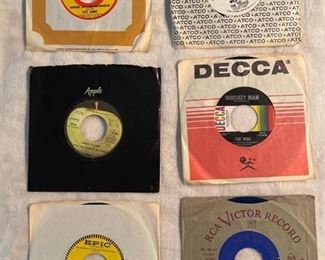 Six 45 rpm records featuring McCartney and Wings, Troggs, The Who, and more