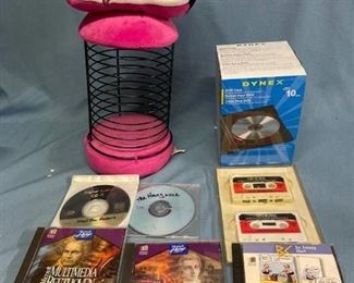 Retro CD holder, DVD cases, and an assortment of media