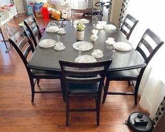 Modern pub style dining room table and chairs. $1250 One leaf, 10 chairs total.
Measurements with leaf
54” w
6’ L
36” t
Leaf 18” w