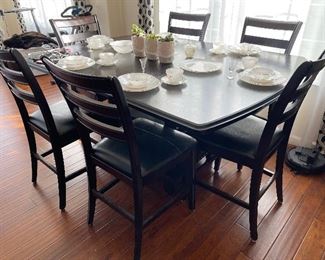 Modern pub style dining room table and chairs. $1250 One leaf, 10 chairs total.
Measurements with leaf
54” w
6’ L
36” t
Leaf 18” w