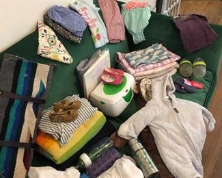 Newborn / Baby clothes, shoes, bedding, wipes warmer, travel changing mat, bottles, receiving blankets, changing pad cover, slings, wraps, bibs, and more. 