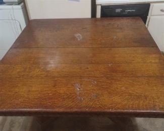 Antique oak ornate dining table with FIVE leafs