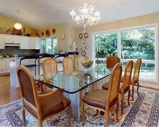 Modernist glass top dining table & eight chairs