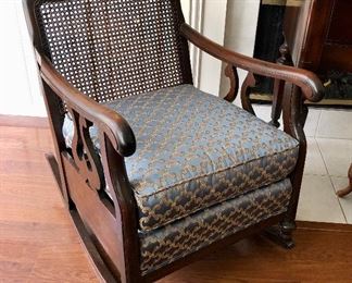 Mahogany framed rocker. Natural hand woven cane webbing. No holes! 