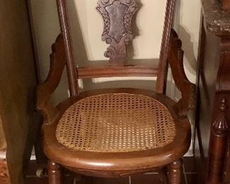Set of 4 Walnut Eastlake caned chairs.