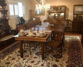Antique oak farmhouse table extends to comfortably seat 8. 