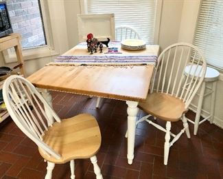 Kitchen table set. Butcher block table top and four white Windsor chairs.