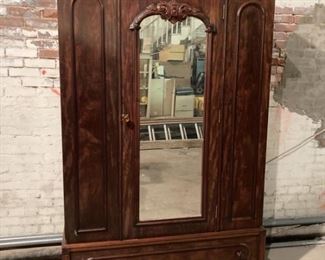 Gorgeous mirror front armoire