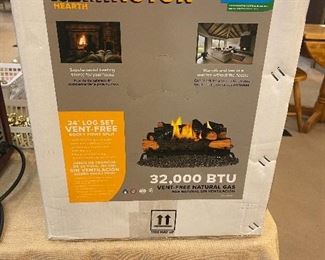 Remington 32,000 BTU Gas  (no vent) Fireplace new in box.