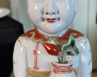 Chinese Porcelain Figurine Man with Flowers		
