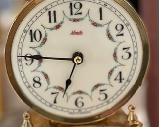 Antique Kundo Anniversary Clock	12 in high by 6.5 diameter	
