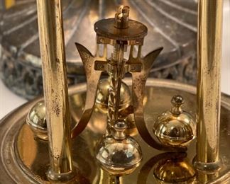 Antique Kundo Anniversary Clock	12 in high by 6.5 diameter	
