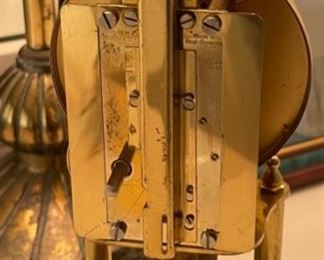 Antique Kundo Anniversary Clock	12 in high by 6.5 diameter	
