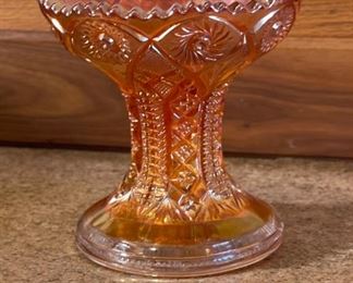 Imperial Marigold Carnival Glass Whirling Star Compote	5.5 in H x  5.5 in diameter	
