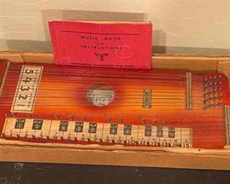MARX Pianolin Stringed Instrument Wood Pianoette Autoharp	3 x 24 x 10in	HxWxD
