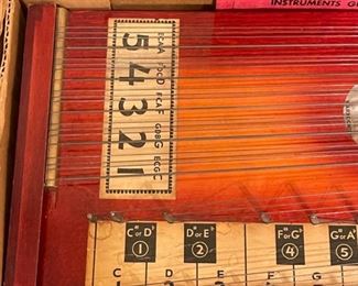 MARX Pianolin Stringed Instrument Wood Pianoette Autoharp	3 x 24 x 10in	HxWxD
