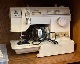 Singer 9002 Sewing Machine	14x17x9in	HxWxD
