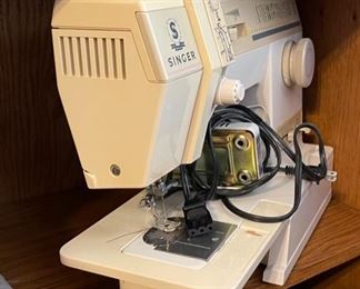 Singer 9002 Sewing Machine	14x17x9in	HxWxD
