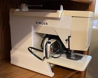 Singer 9002 Sewing Machine	14x17x9in	HxWxD
