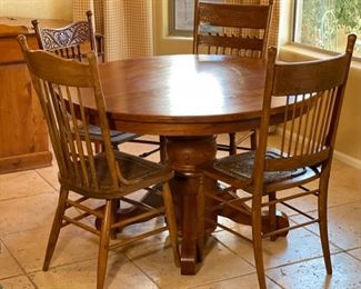Antique Dining Table w/ 4 Mismatch Chairs	30in H x 48in  diameter	
