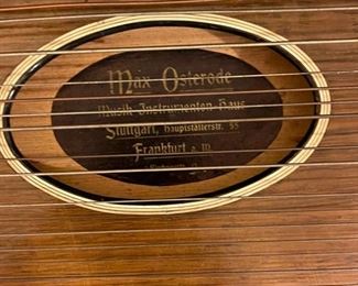Antique Max Osterode Zither Stringed Instrument in case	3 x 26 x 15in	HxWxD
