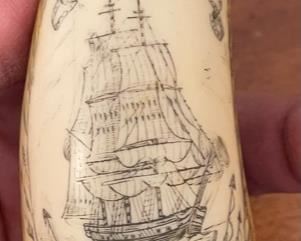 Reproduction Scrimshaw Wale Tooth Mercury	4 inches high	
