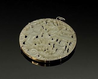 Chinese White Jade Disc Pendant Gold mount	2.25in Diameter	
