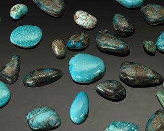 Lot of 39 Polished Turquoise Cabochon Stones		
