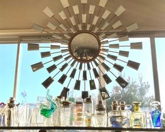 Dramatic Gilded Convex-Sunburst Beveled mirror over the bar