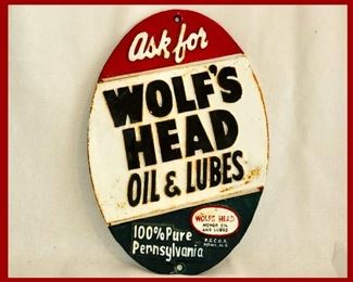 Cast Iron Wolfs Head Oil & Lubes Sign  