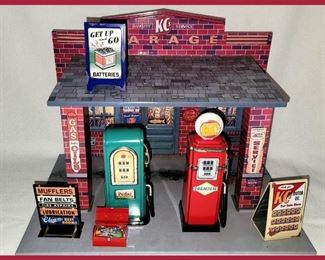 KCs Metal Garage with Unattached Signs and Toolbox 