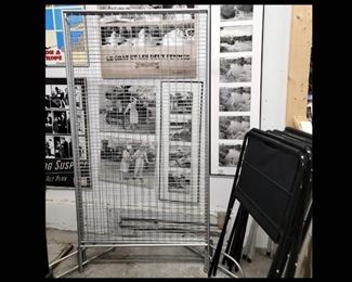 One of a Few Tall Fold Out Metal Display Walls and Many Flip Through Print Stands Available