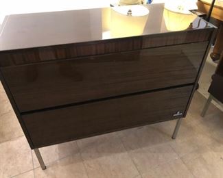 Grundig stereo to the speakers in the prior pic..  The stereo works but the turn table needs some work.  All of the original documentation and many parts come with this piece. 