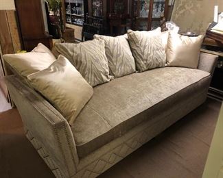 Panel end sofa in gray velvet with chrome tack detail 92"  X 38" deep  X 28" high at arm & 36" high with pillows