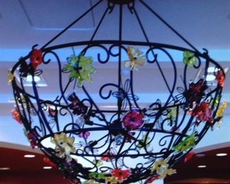 Large metal chandelier with blown glass flowers 