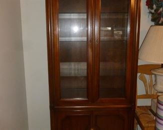 One of a pair of nice small china cabinets