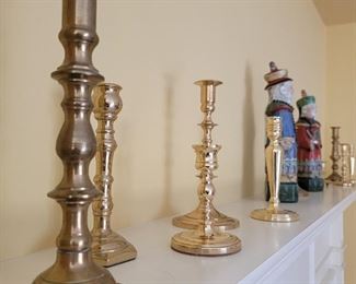 Assorted brass candlesticks - range in size from 4" to 11"