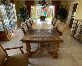 Dining room table with 10 chairs. $2000. (or best offer)