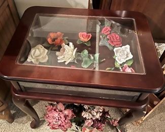 This is a beautiful glass-top side table.