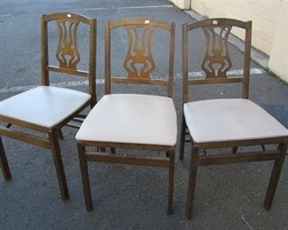 three folding chairs