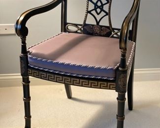 Set of two vintage Regency ebonized and gilt chinoiserie arm chairs with paw feet. Photo 1 of 3.