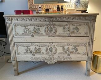 Vintage French replica commode with exquisite detailing and relief carving on three sides. Measures 46" W x 21" D x 35" H.