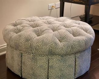 Upholstered, tufted and skirted blue and white animal print ottoman. Measures 35" D x 18" H. Photo 1 of 2.