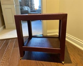 Oxblood colored sea grass side table on casters. Measures 24" W x 18" D. Photo 3 of 3.