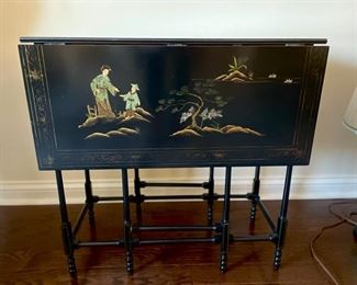 Vintage Chinese Export-style ebonized, gate-leg drop leaf table. Measures 28" D x 13.5"W. Two drop leaf sides each measure 12." Photo 1 of 3.