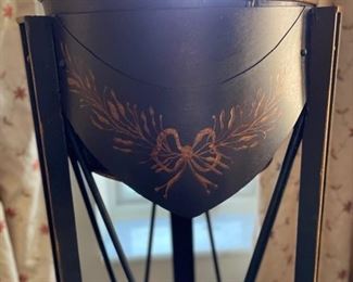 Ebony metal plant stand with gilt details - 2 available. Each measures 48" H x 16" D. Photo 3 of 5.