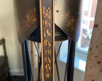 Ebony metal plant stand with gilt details - 2 available. Each measures 48" H x 16" D. Photo 2 of 5.