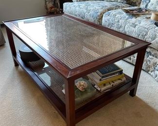 Vintage two-self cane-top cocktail table. Measures 26" x 42" x 18" H. Photo 3 of 3.