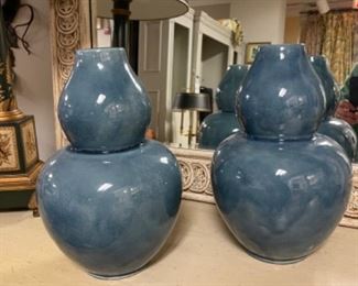 Pair of blue Thai Celadon glazed ceramic vases. Each measures 13” H.